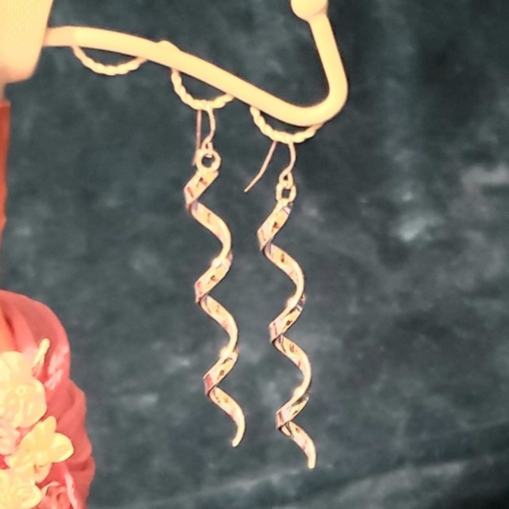 Silver corkscrew dangle earrings
